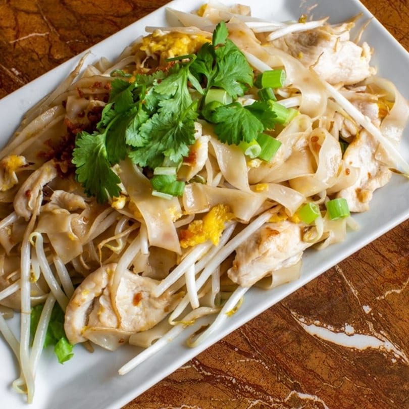 Thai Kitchen's Pad See Ew with wide noodles, chicken, egg, bean sprouts, and cilantro.